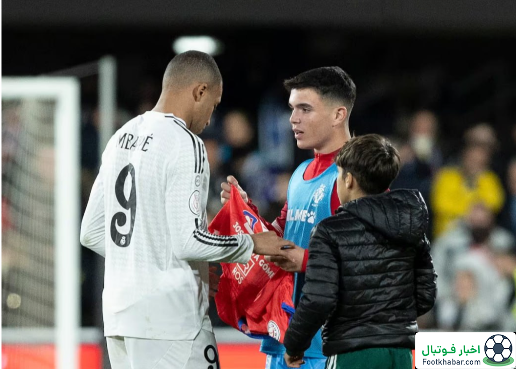 کودکی که نمی‌خواست از امباپه جدا شود (عکس)